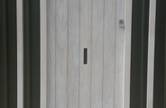 Accoya tongue and groove door primed white outside