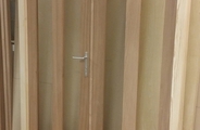 Hardwood door set with espagnolette locking system