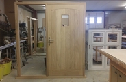 Oak toungue and groove door with glazed panel inside