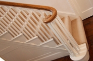 Finished staircase with monkey tail handrail