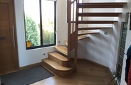 Open riser stained oak staircase