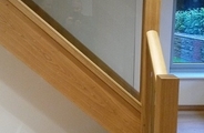 Solid oak staircase with glass panels no2